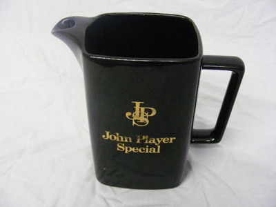 A John Player Special whisky water jug made by wade england 145cm tall 9cm 